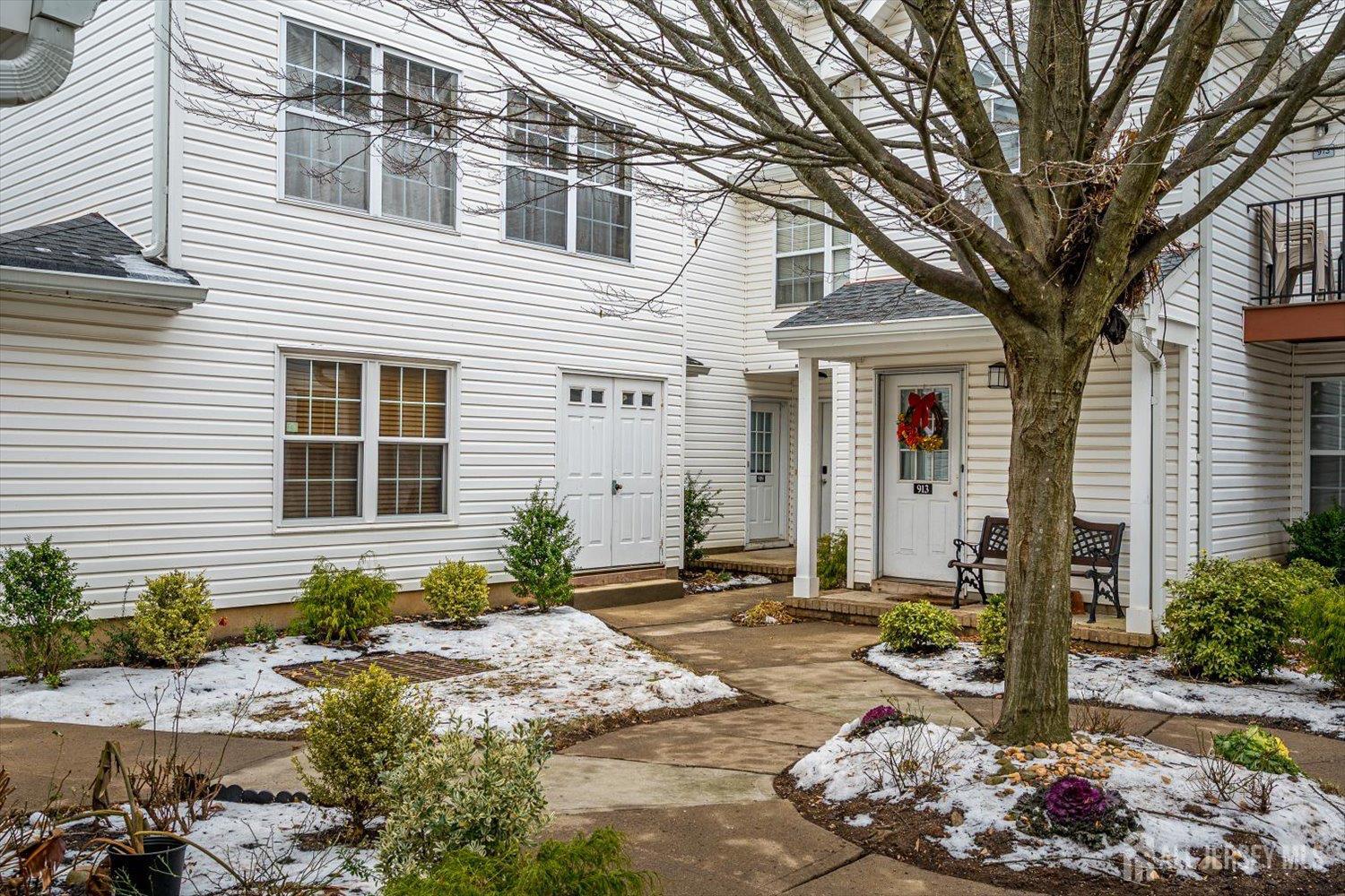 919 Plymouth Road North Brunswick, NJ 08902 - Photo 2 of 33 a front view of a house with a tree