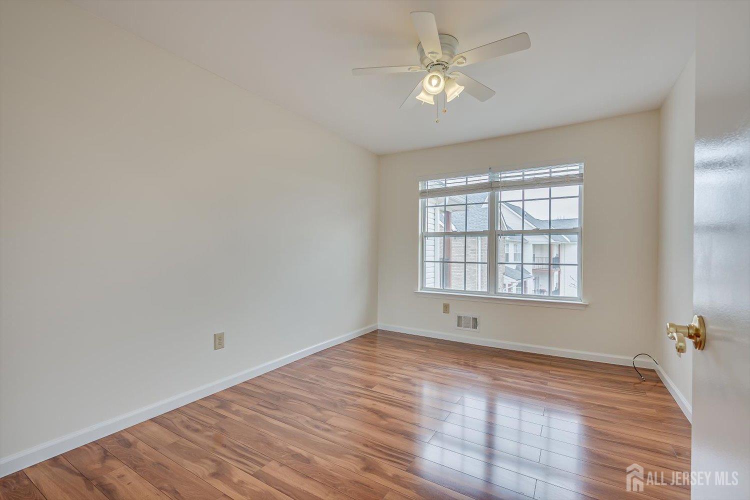 919 Plymouth Road North Brunswick, NJ 08902 - Photo 25 of 33 a view of an empty room with a window