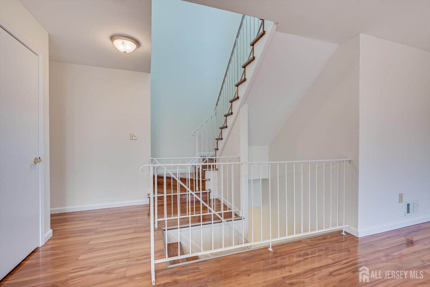 919 Plymouth Road North Brunswick, NJ 08902 - Photo 10 of 33 a view of entryway with wooden floor