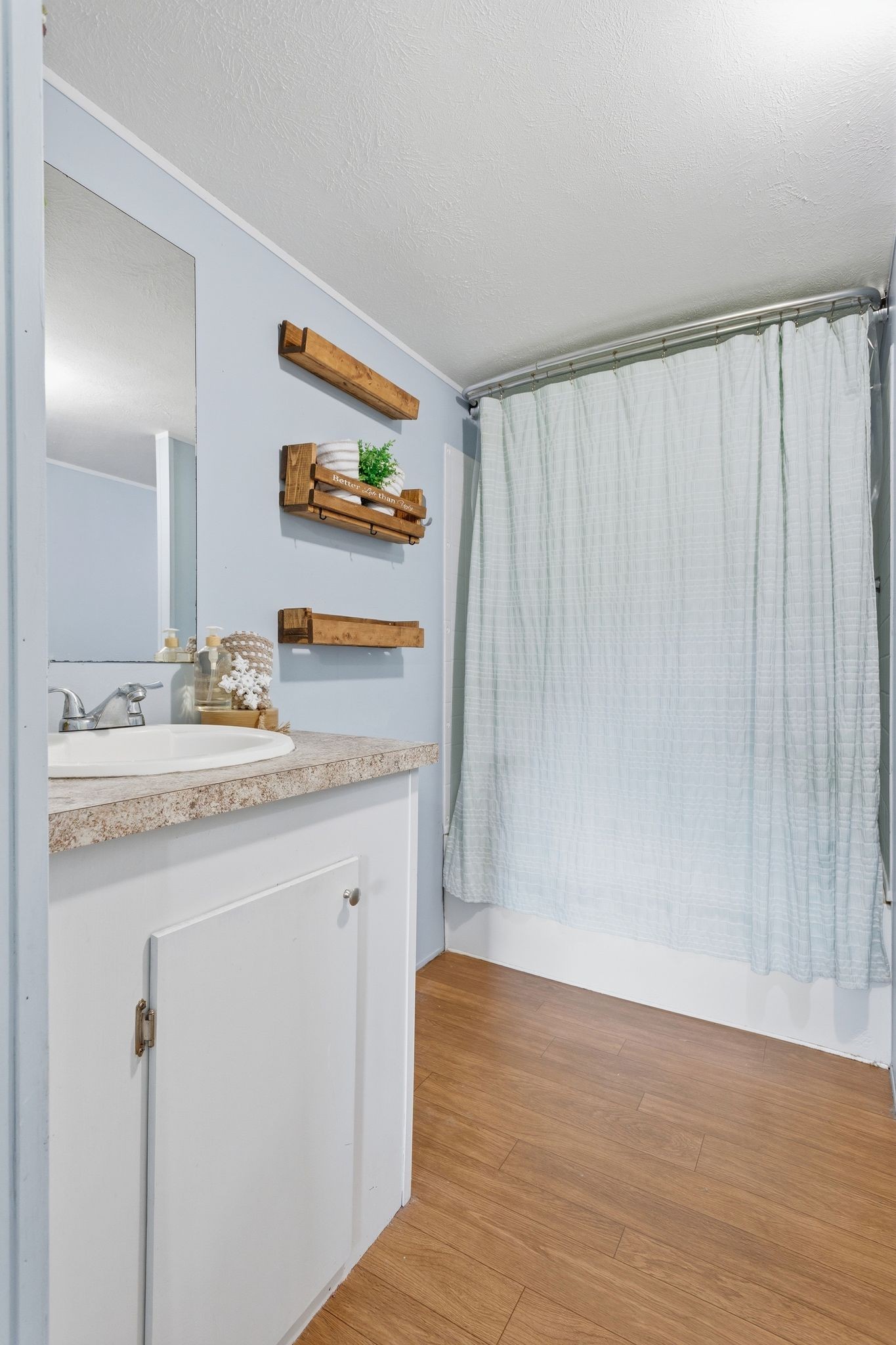 3204 Grizzly Road Culleoka, TN 38451 - Photo 12 of 25 a bathroom with a granite countertop sink and a mirror