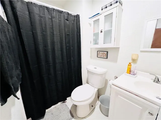 a bathroom with a sink and a toilet