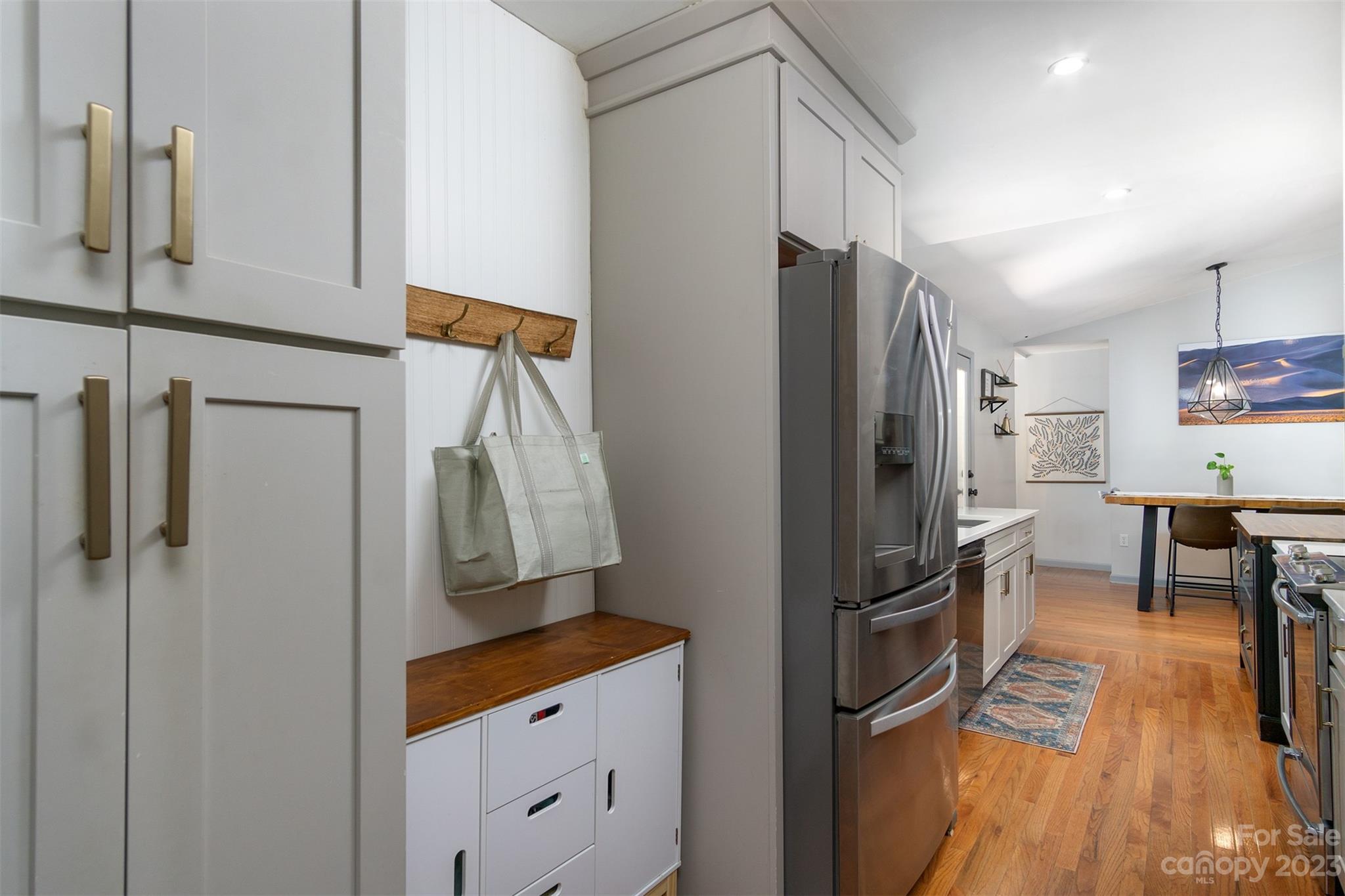 13 Woodfield Road Arden, NC 28704 - Photo 13 of 41 a kitchen with stainless steel appliances a refrigerator and a stove