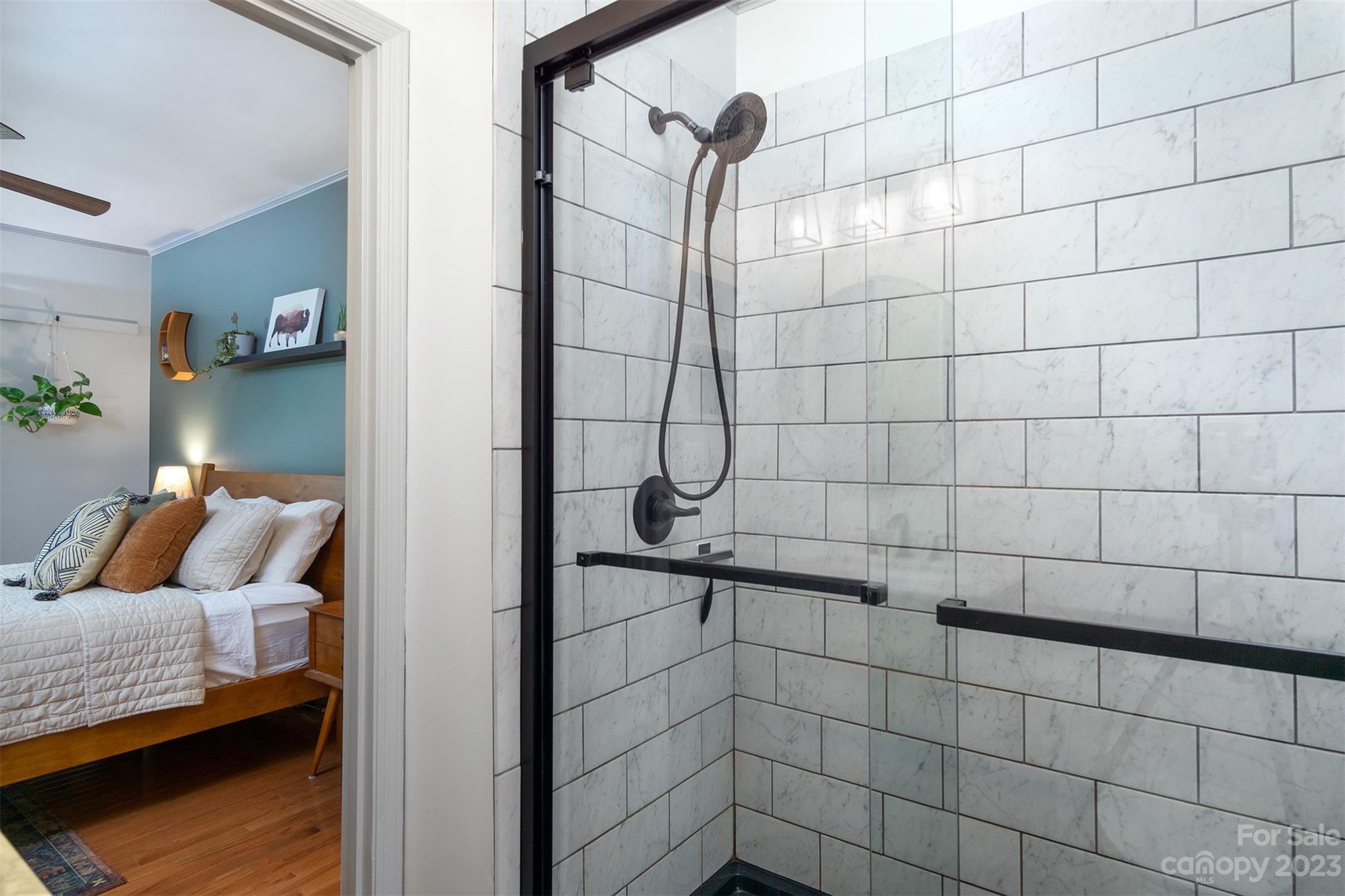 13 Woodfield Road Arden, NC 28704 - Photo 18 of 41 a bathroom with a shower