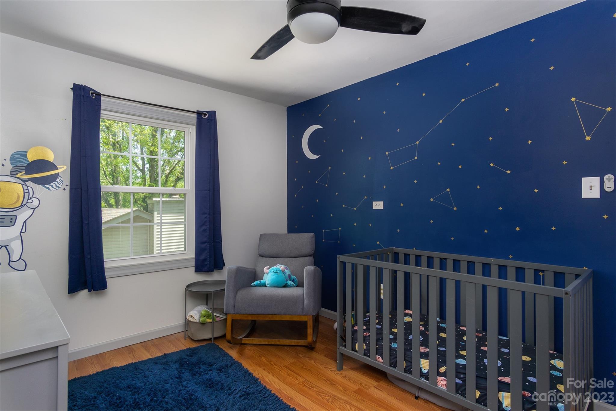 13 Woodfield Road Arden, NC 28704 - Photo 22 of 41 a livingroom with furniture window and wooden floor