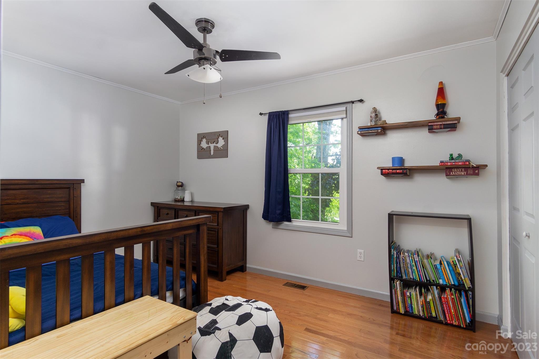 13 Woodfield Road Arden, NC 28704 - Photo 24 of 41 a bedroom with furniture and a window