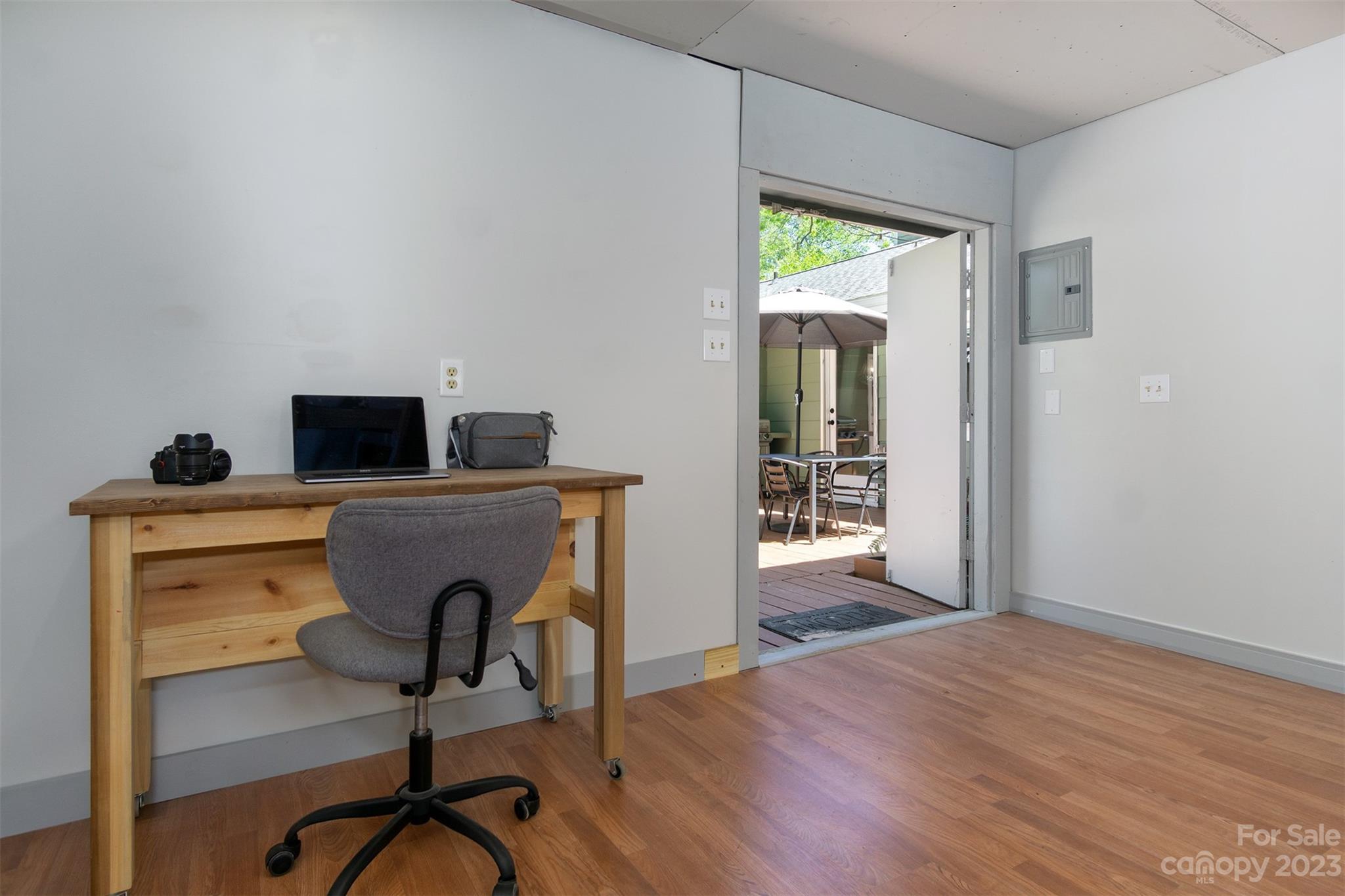 13 Woodfield Road Arden, NC 28704 - Photo 32 of 41 a view of a workspace with furniture and bathroom