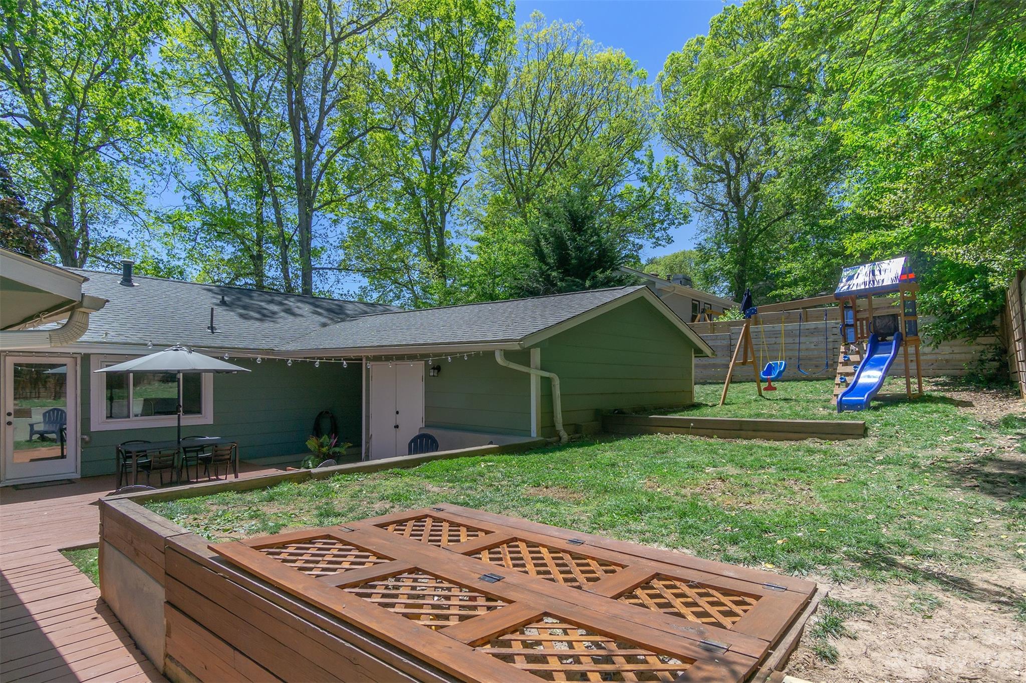 13 Woodfield Road Arden, NC 28704 - Photo 34 of 41 front view of a house with a yard