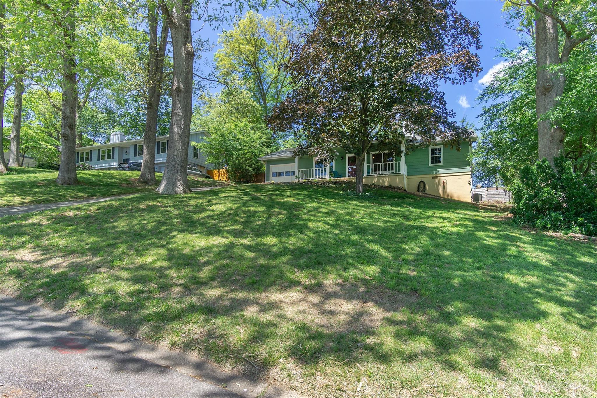 13 Woodfield Road Arden, NC 28704 - Photo 41 of 41 a view of a house with a backyard