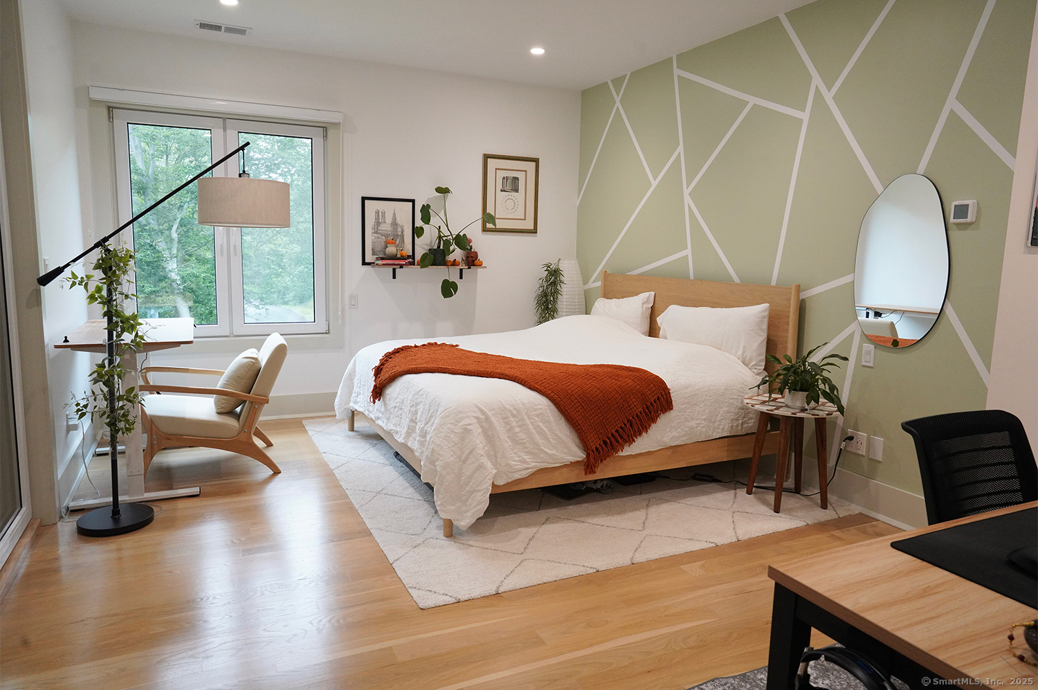 9 Grey Fox Lane Weston, CT 06883 - Photo 26 of 37 a bed room with a bed and a chair