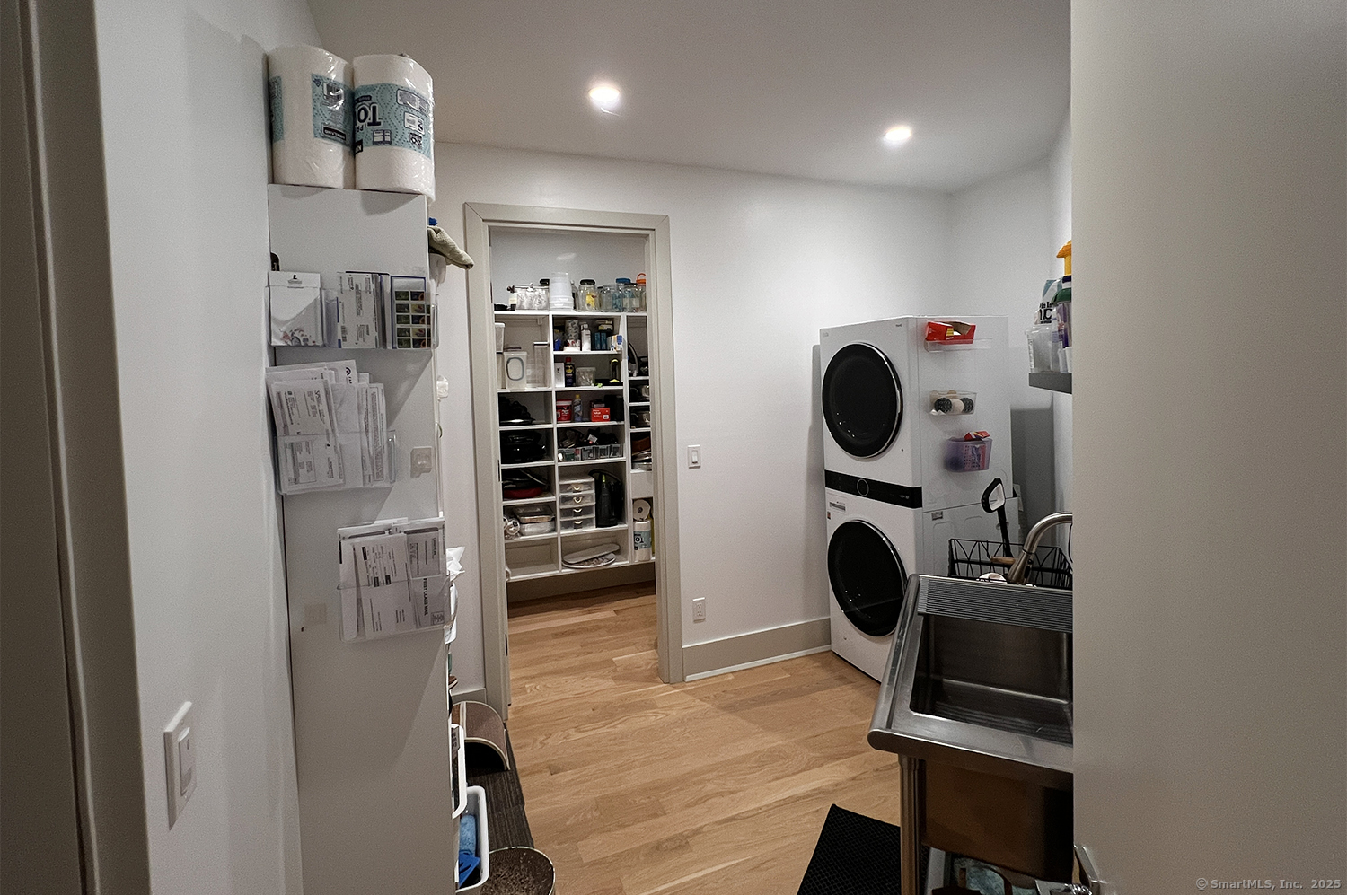 9 Grey Fox Lane Weston, CT 06883 - Photo 34 of 37 a view of walk in closet with clothes and shoes