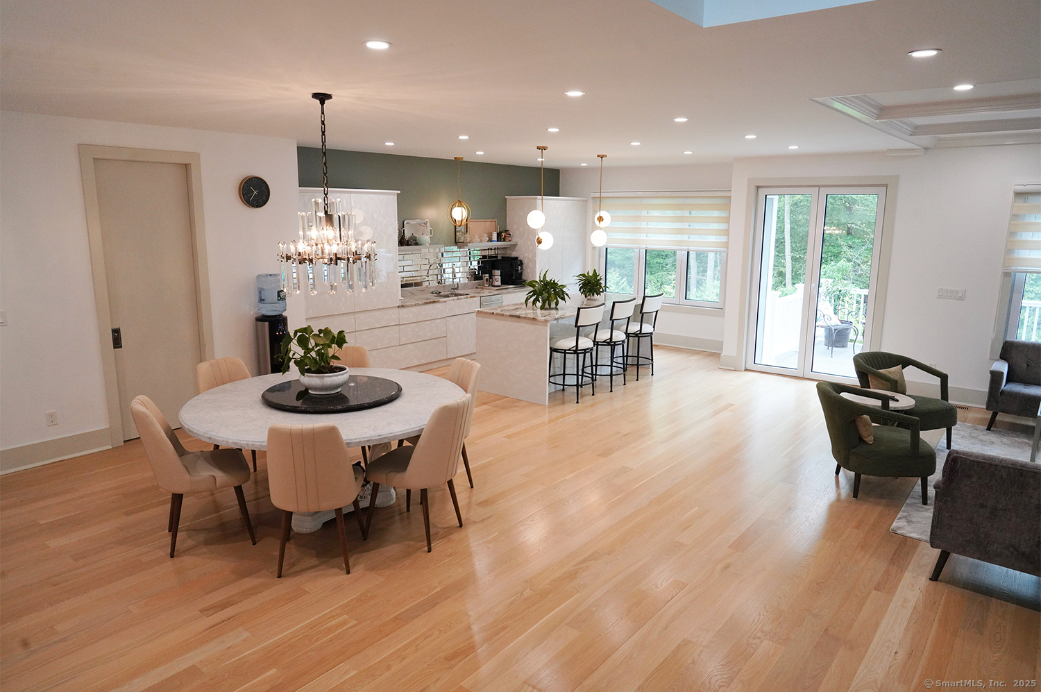 9 Grey Fox Lane Weston, CT 06883 - Photo 5 of 37 a view of a dining room with furniture and wooden floor