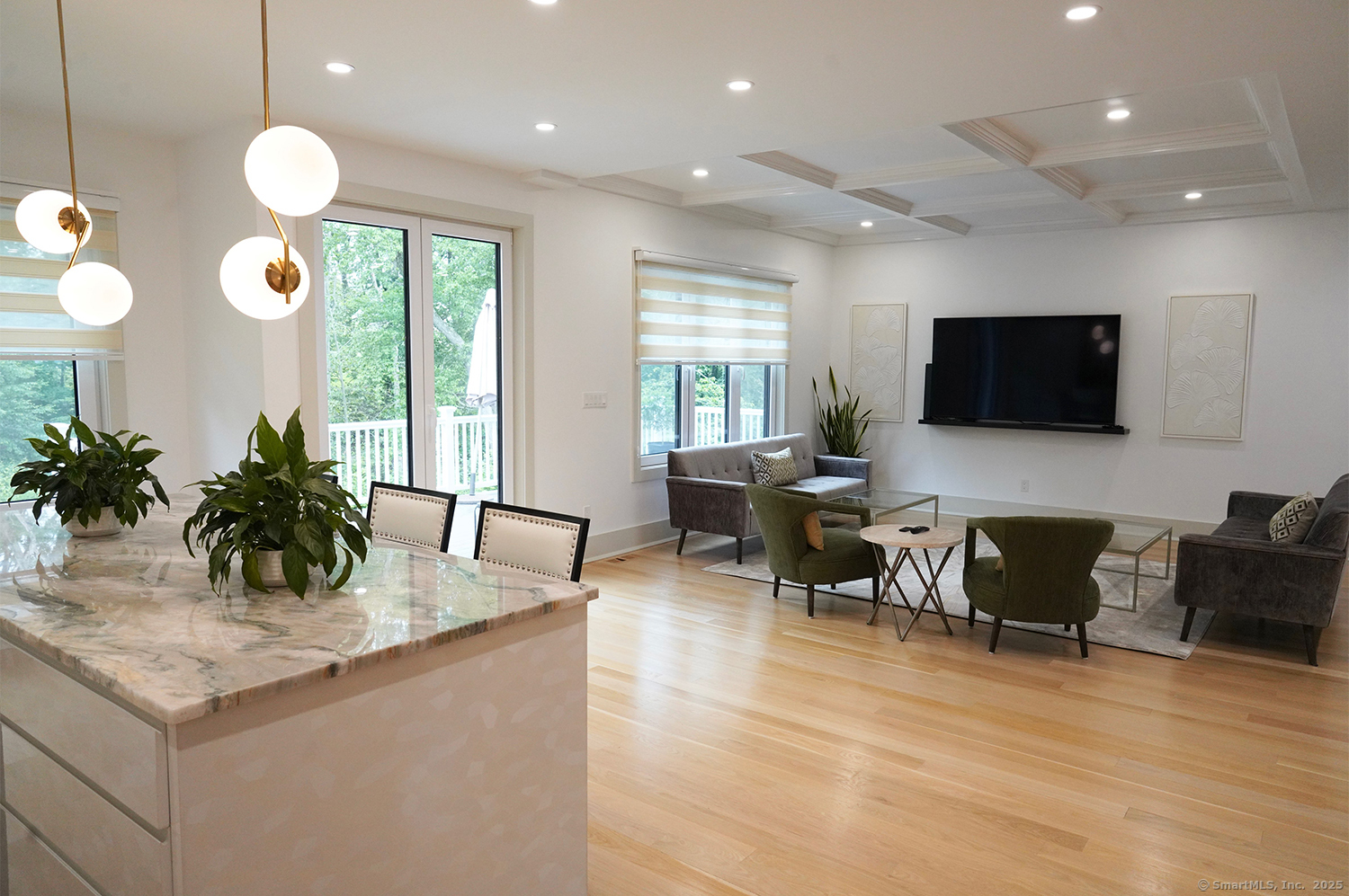 9 Grey Fox Lane Weston, CT 06883 - Photo 7 of 37 a living room with furniture and a flat screen tv