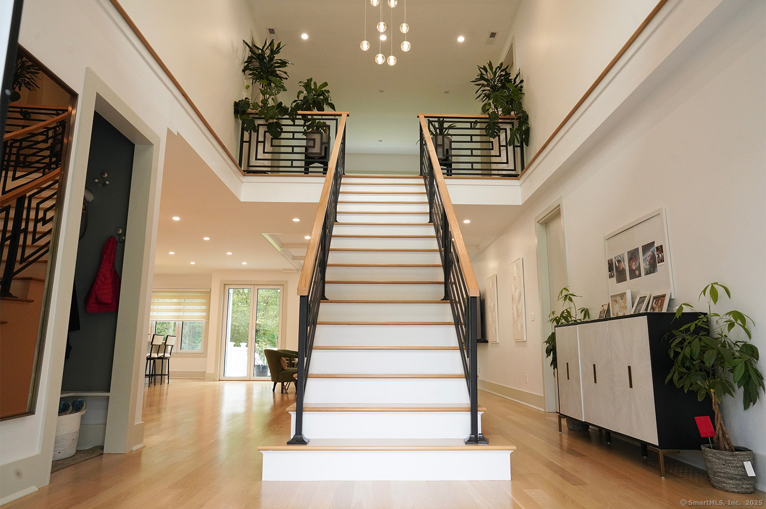 9 Grey Fox Lane Weston, CT 06883 - Photo 8 of 37 a view of entryway and hall with wooden floor