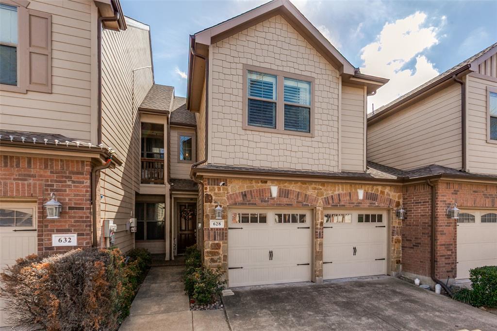 a view of a house with a garage