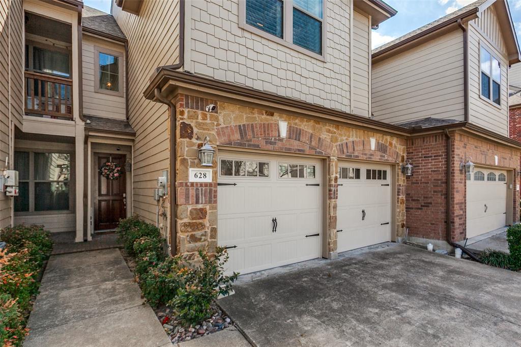 628 Raford Hill Lane Richardson, TX 75081 - Photo 2 of 34 a front view of a building with potted plants