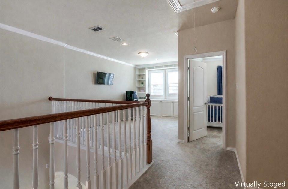 628 Raford Hill Lane Richardson, TX 75081 - Photo 23 of 34 a view of a hallway with closet