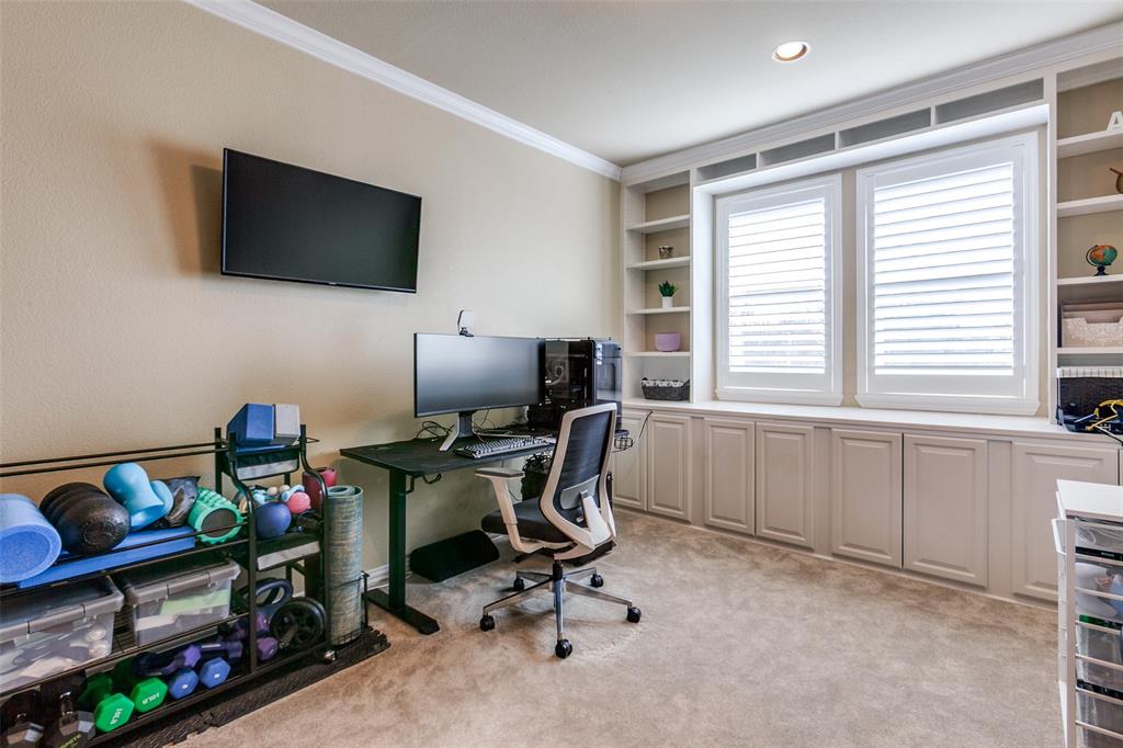 628 Raford Hill Lane Richardson, TX 75081 - Photo 24 of 34 a view of a workspace with furniture and a window