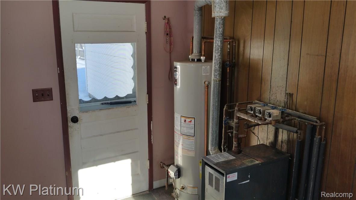 3116 Vincent Road North Street, MI 48049 - Photo 25 of 29 MUD ROOM WITH UTILITIES