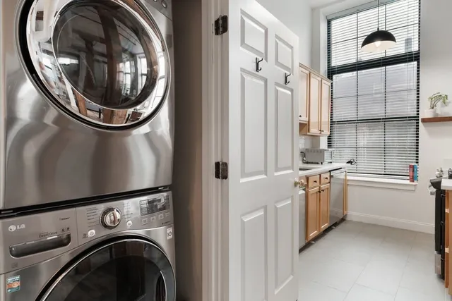 a view of a kitchen with washer and dryer