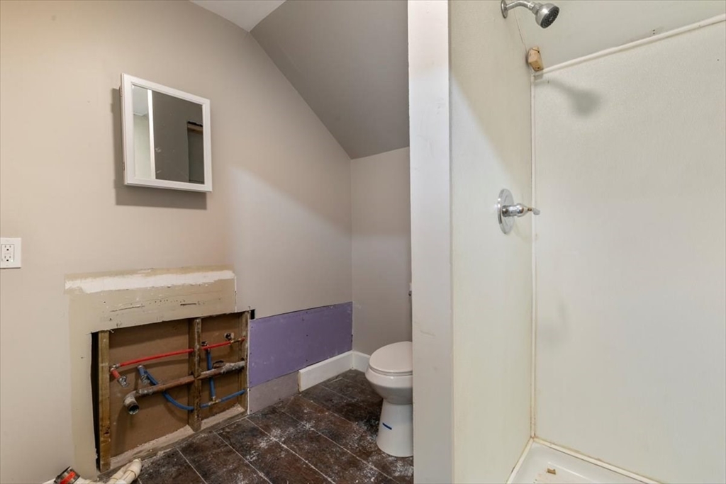 31 Garfield Street Lawrence, MA 01843 - Photo 15 of 31 a bathroom with a toilet a sink and a shower