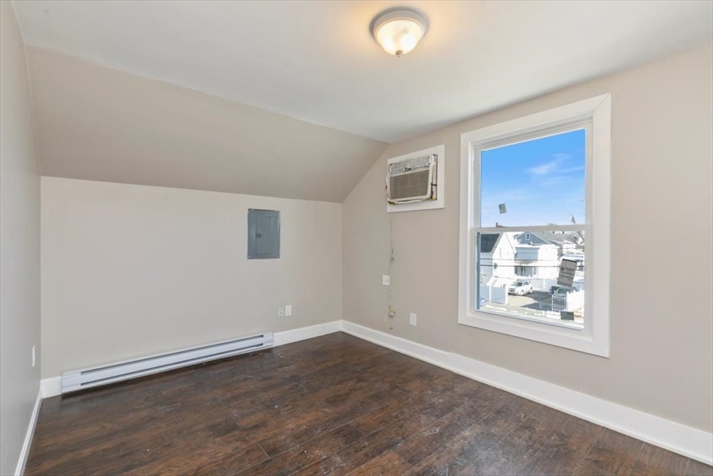 31 Garfield Street Lawrence, MA 01843 - Photo 19 of 31 an empty room with windows and closet