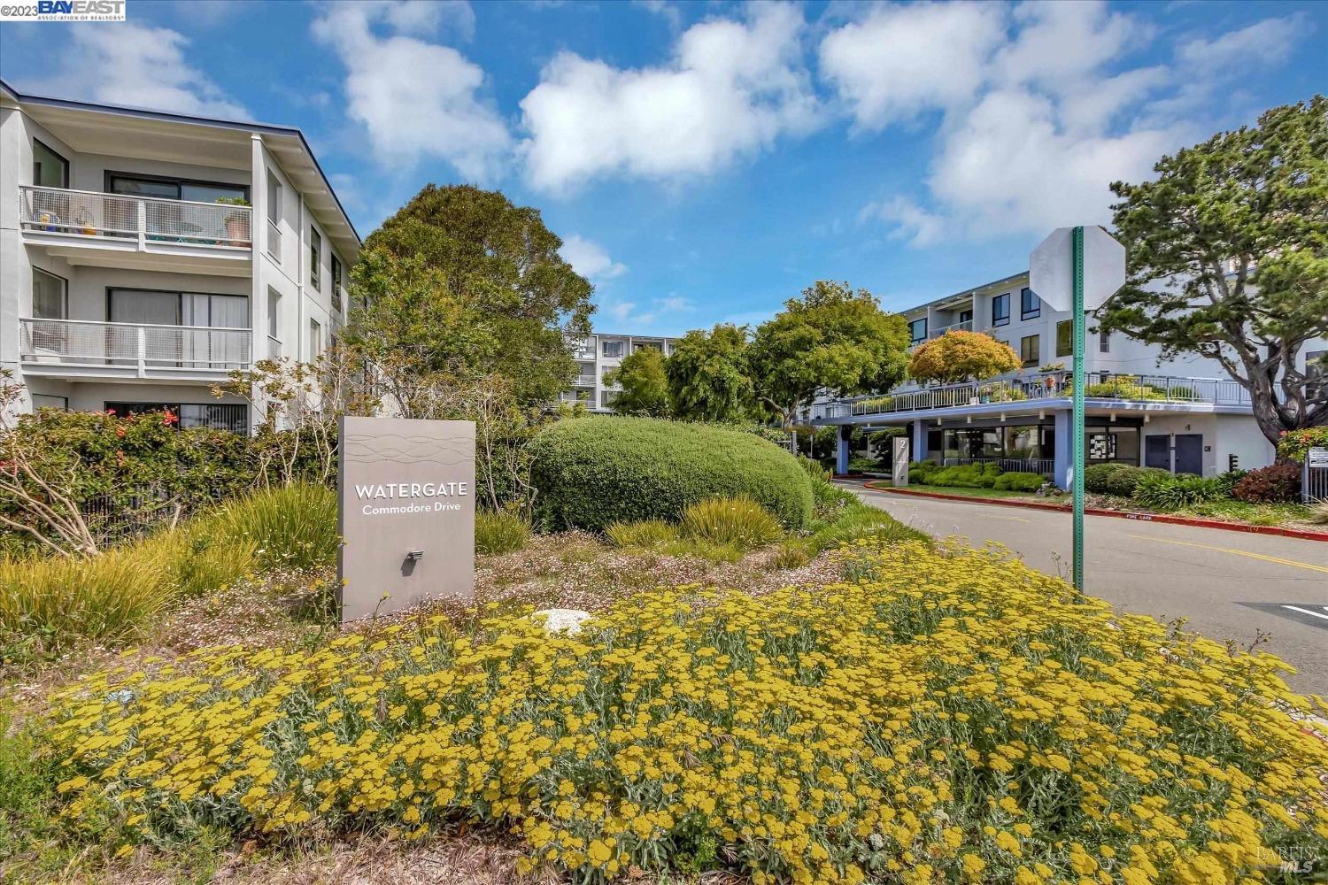3 Commodore Drive, Unit B157 Emeryville, CA 94608 - Photo 1 of 1 a front view of a house with a yard