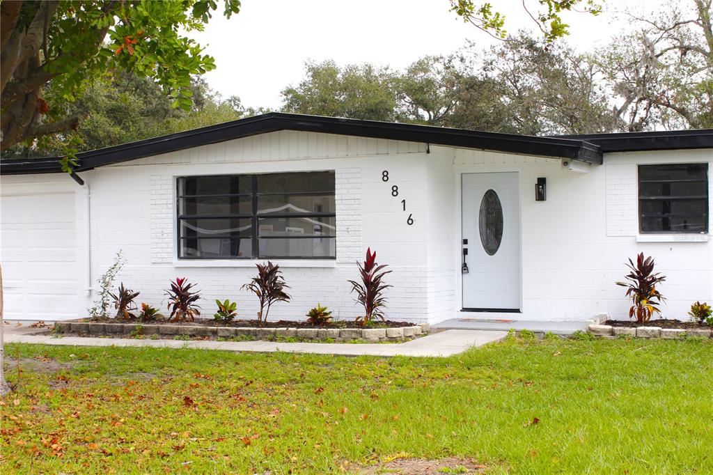 8816 Ashman Road Riverview, FL 33578 - Photo 1 of 52 a view of swimming pool with a yard