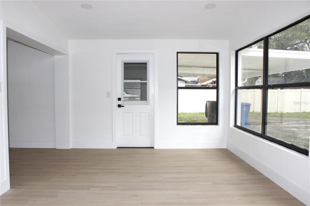 8816 Ashman Road Riverview, FL 33578 - Photo 28 of 52 a view of an empty room with a window