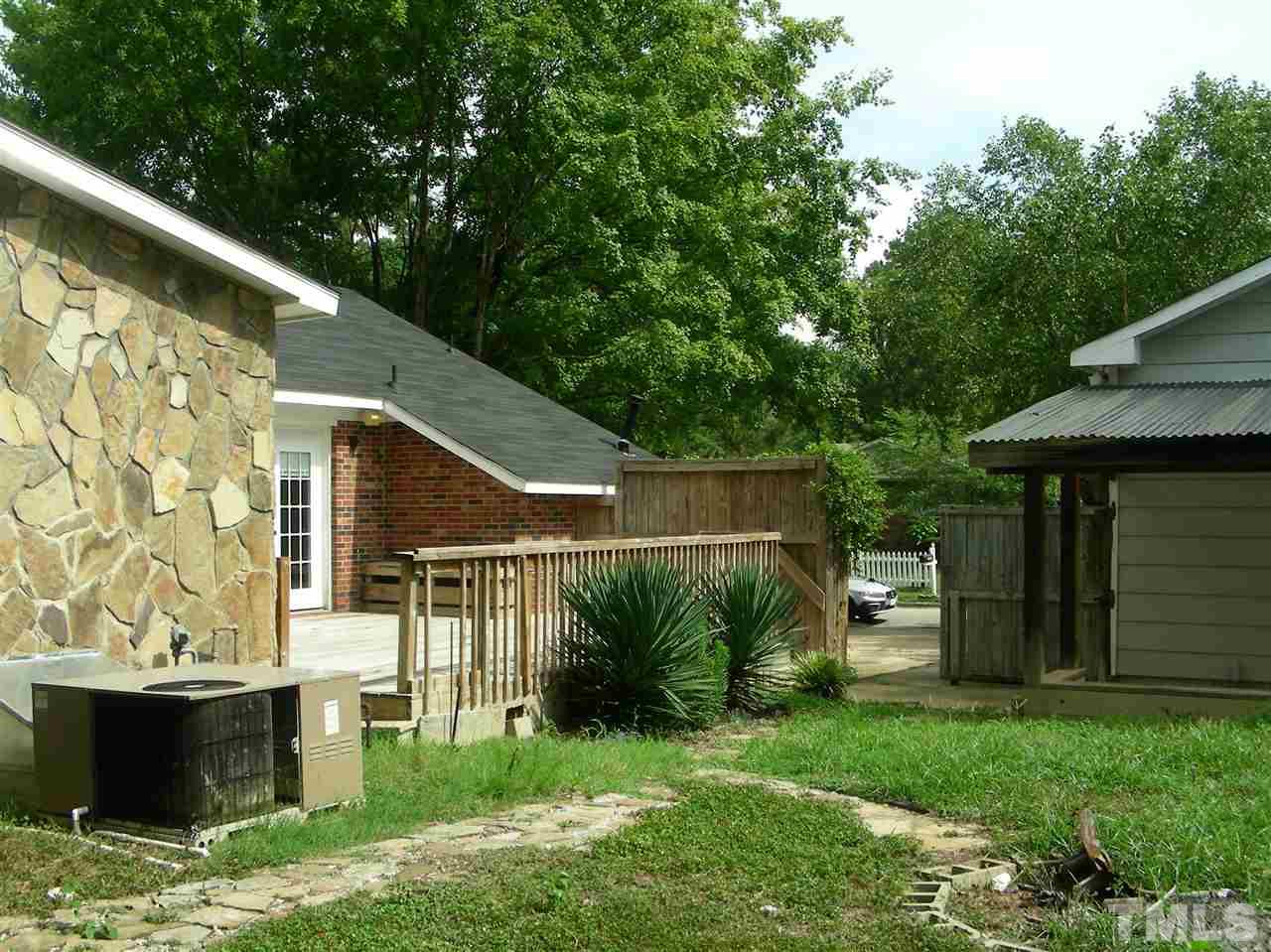 4228 Green Road Raleigh, NC 27604 - Photo 3 of 9 a view of a backyard