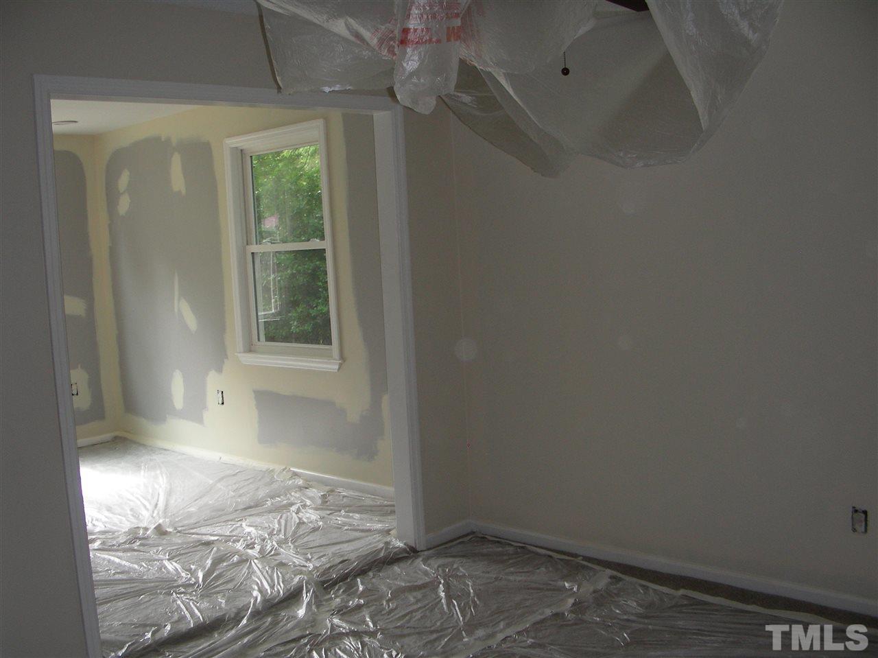 4228 Green Road Raleigh, NC 27604 - Photo 8 of 9 an empty room with windows