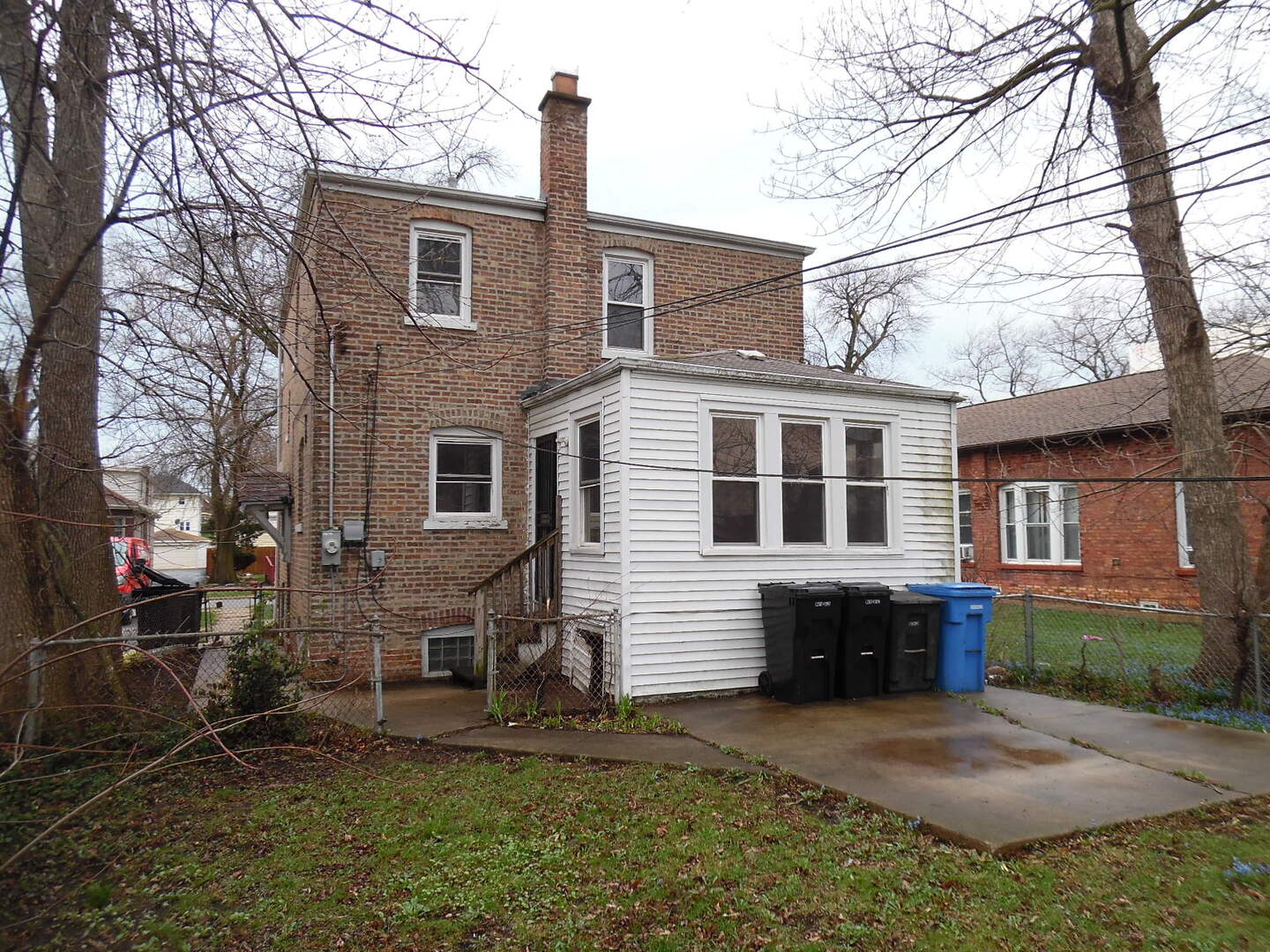 9601 South Charles Street Chicago, IL 60643 - Photo 2 of 12 a front view of a house with a yard