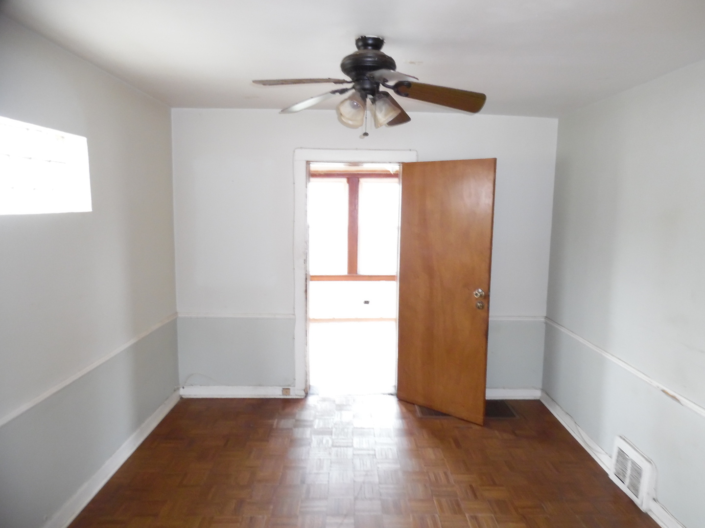 9601 South Charles Street Chicago, IL 60643 - Photo 6 of 12 a view of empty room with wooden floor and fan