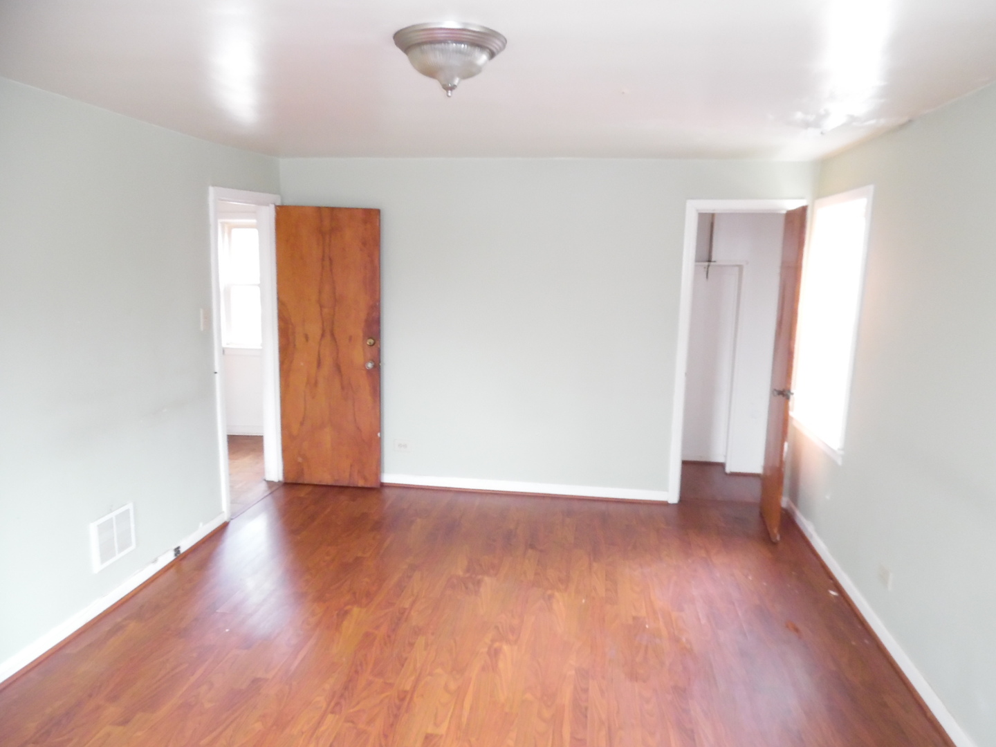 9601 South Charles Street Chicago, IL 60643 - Photo 8 of 12 a view of an empty room with wooden floor