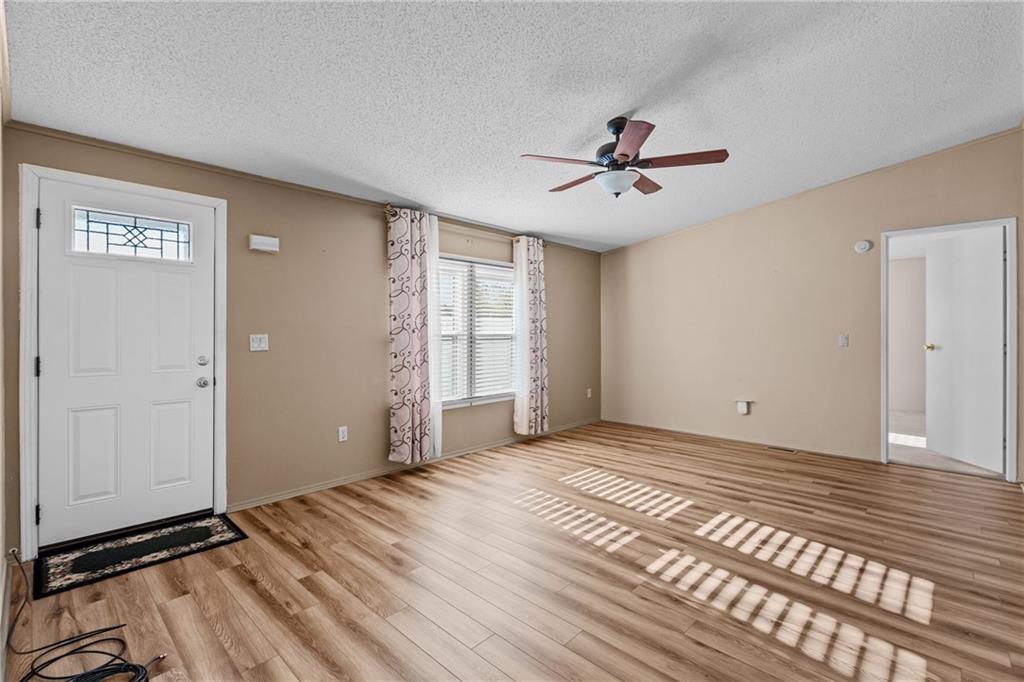264 Ridge Lane Murrysville, PA 15668 - Photo 9 of 35 Well lit living room-notice the upgraded door!