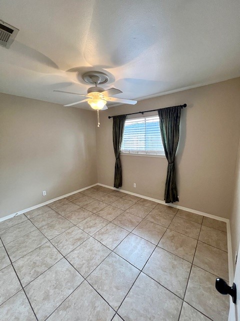 8006 Pinedale Cove Austin, TX 78757 - Photo 12 of 22 a view of empty room with window and chandelier fan