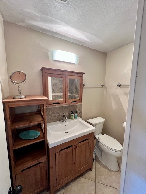8006 Pinedale Cove Austin, TX 78757 - Photo 14 of 22 a bathroom with a sink a toilet and a mirror