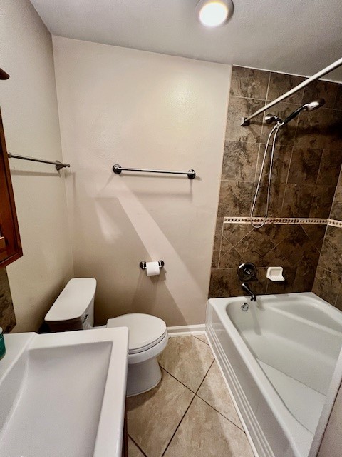 8006 Pinedale Cove Austin, TX 78757 - Photo 15 of 22 a bathroom with a sink a toilet and shower