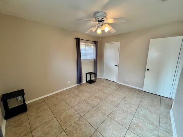8006 Pinedale Cove Austin, TX 78757 - Photo 19 of 22 a view of an empty room with a chandelier fan
