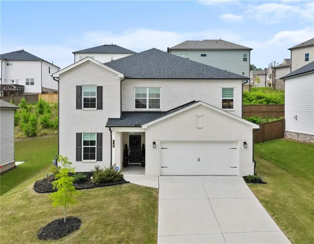 a view of house with garden