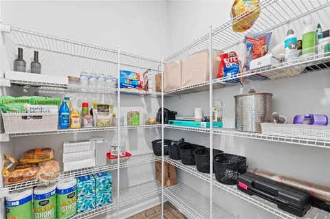 a bathroom with a sink toilet and a mirror