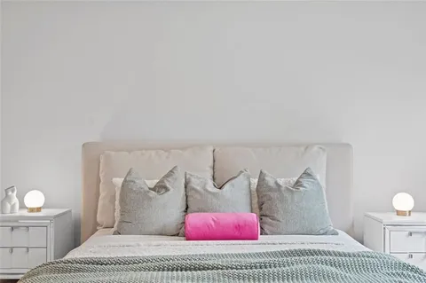 a kitchen with a sink and refrigerator