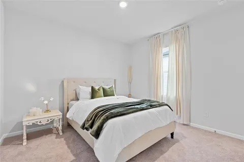 a view of a workspace with furniture and windows