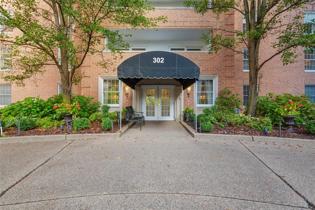 front view of a house with a street