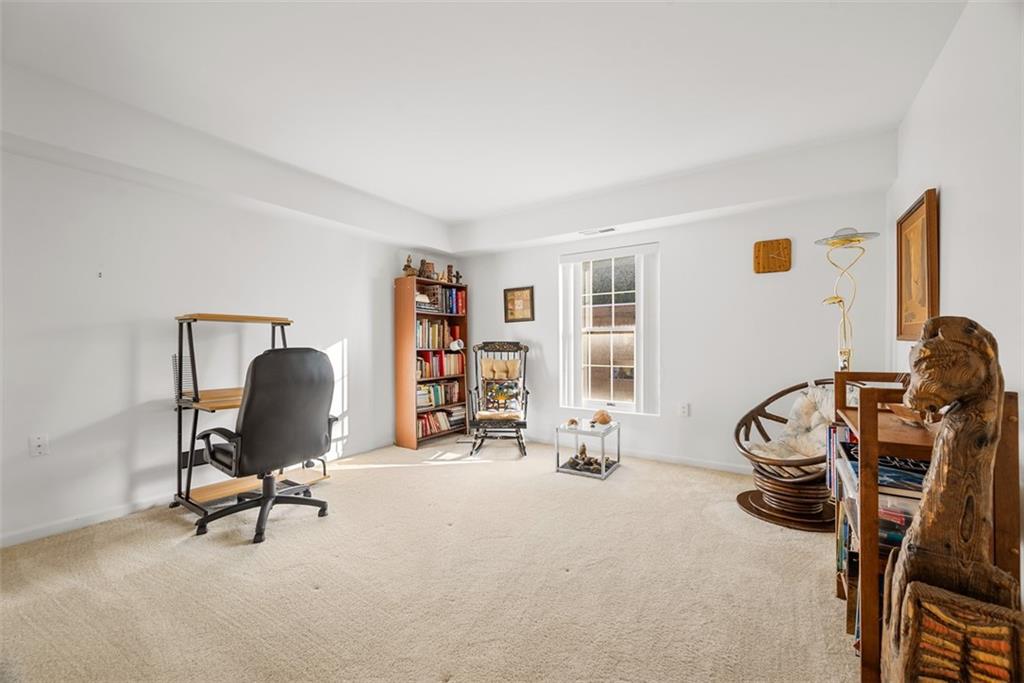 302 Fox Chapel Road, Unit 613 Pittsburgh, PA 15238 - Photo 27 of 37 a view of a workspace with furniture and a window