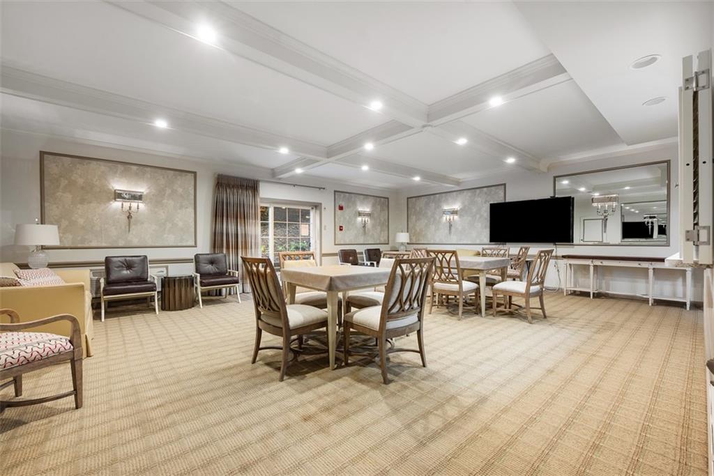 302 Fox Chapel Road, Unit 613 Pittsburgh, PA 15238 - Photo 33 of 37 a view of a dining room with furniture window and wooden floor