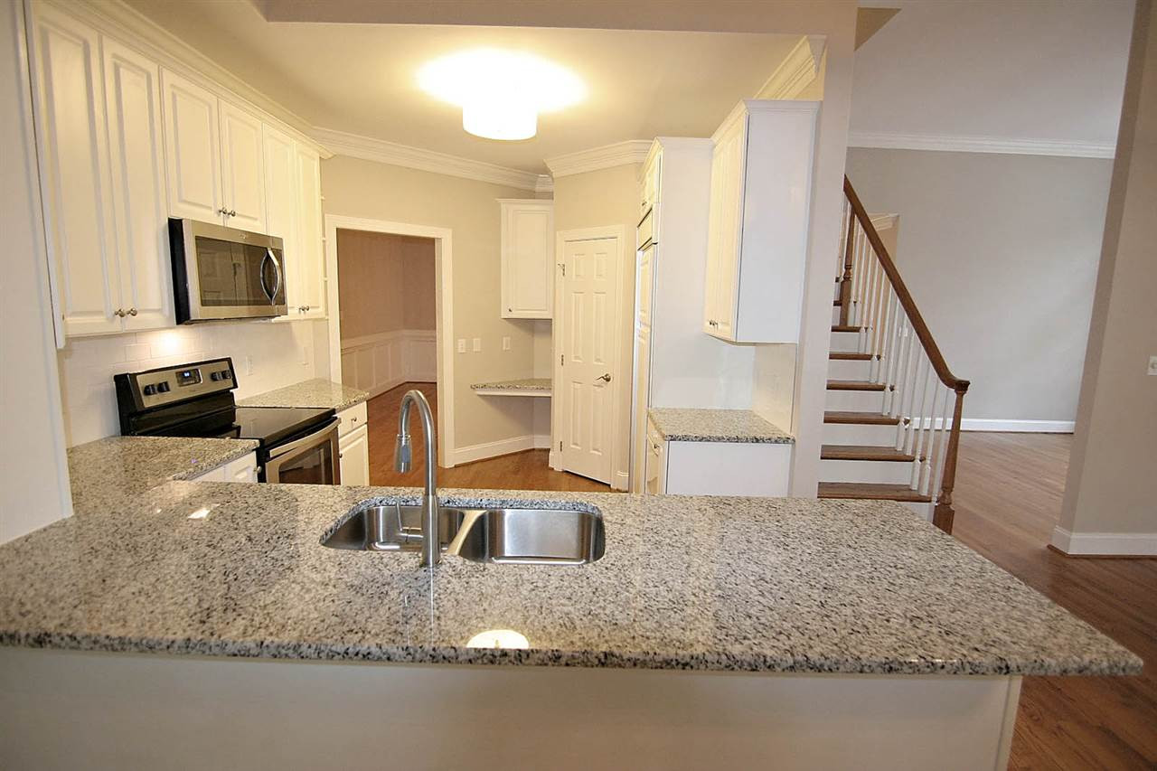 152 Yorkchester Way Raleigh, NC 27615 - Photo 8 of 25 Kitchen W/Breakfast Bar