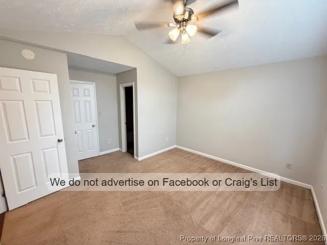 a view of a hallway with entryway