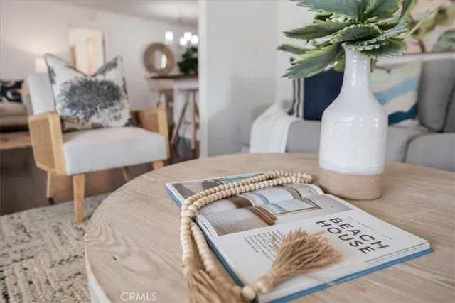 a bedroom with a bed and a potted plant