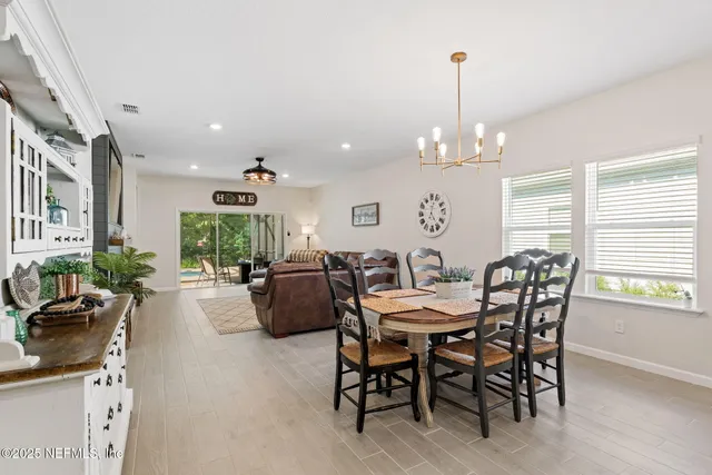 a bedroom with a bed and cabinets