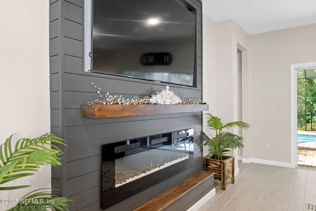 a bathroom with a double vanity sink mirror and bathtub